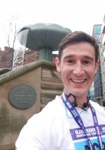 Trainee Financial Planner James Fisher with his medal after the Sheffield Half Marathon 2018