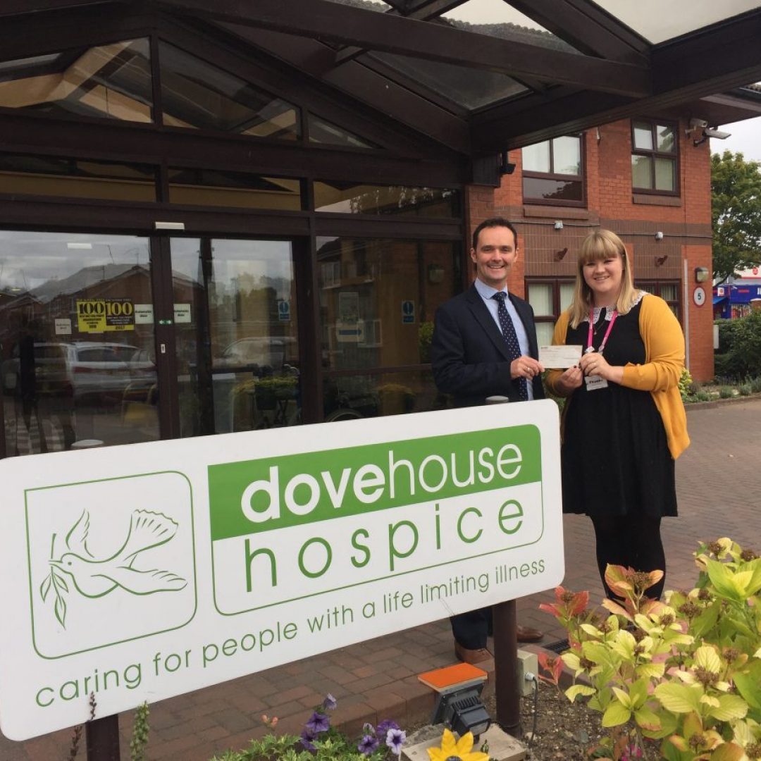 Lifetime financial planner Robert Bligh presents referral scheme cheque to Dove House Hospice
