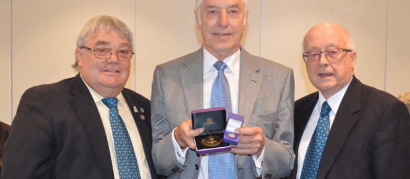 Lifetime client and football lover Bob receives long service award from FA