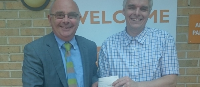 Lifetime thrilled to present new hospice fundraiser Brian with referral scheme cheque