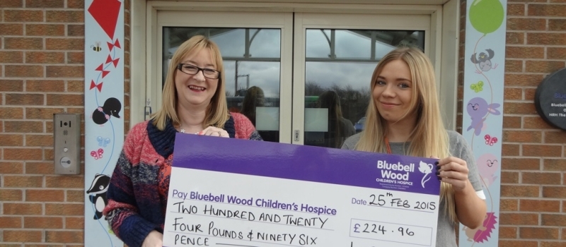 Lifetime financial planner Jan presents referral scheme cheque to Bluebell Wood