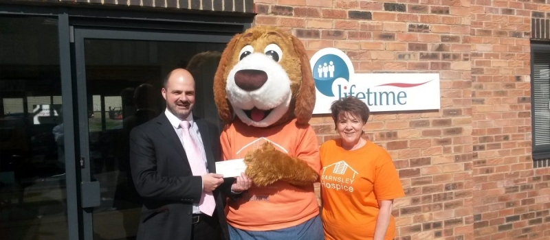 Lifetimer Matt presents referral scheme cheque to Barnsley Hospice