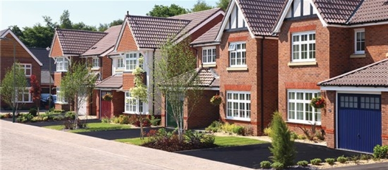 UK housing market is moving more slowly than a year ago, new figures show